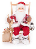 Dekorácia MagicHome Vianoce Santa sediaci 46cm